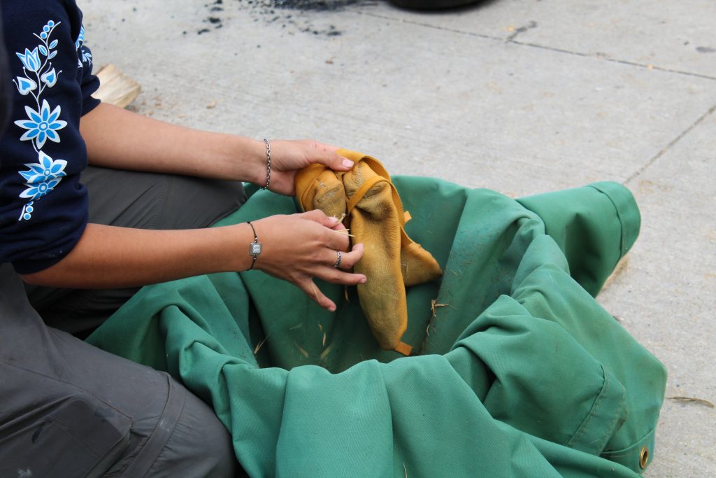 Hands holding an object